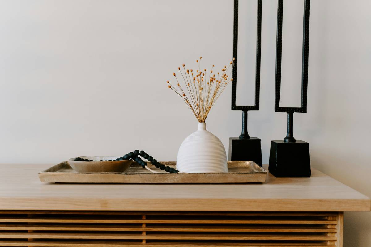 Minimalist jewelry box home decor paired with ceramic vase and dried pampas grass